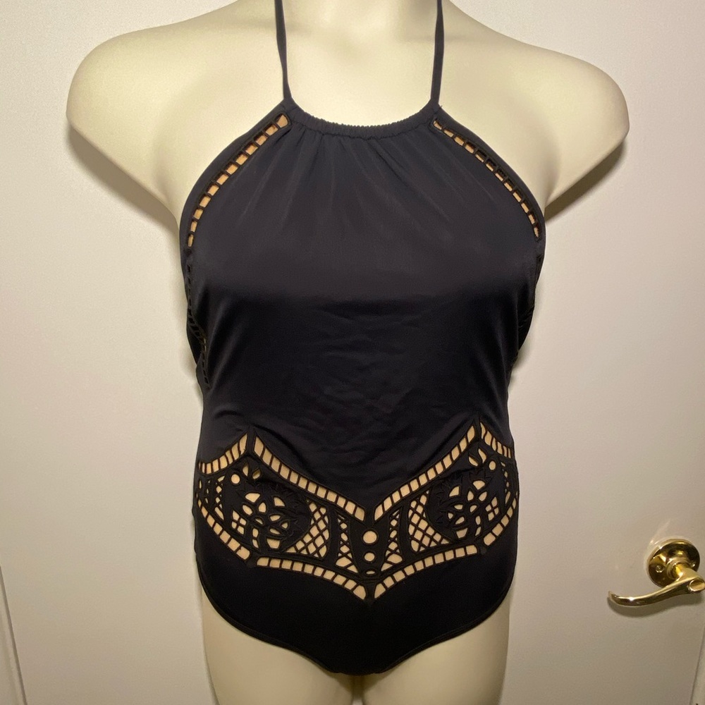 Black one piece swimsuit with nude inner lining
